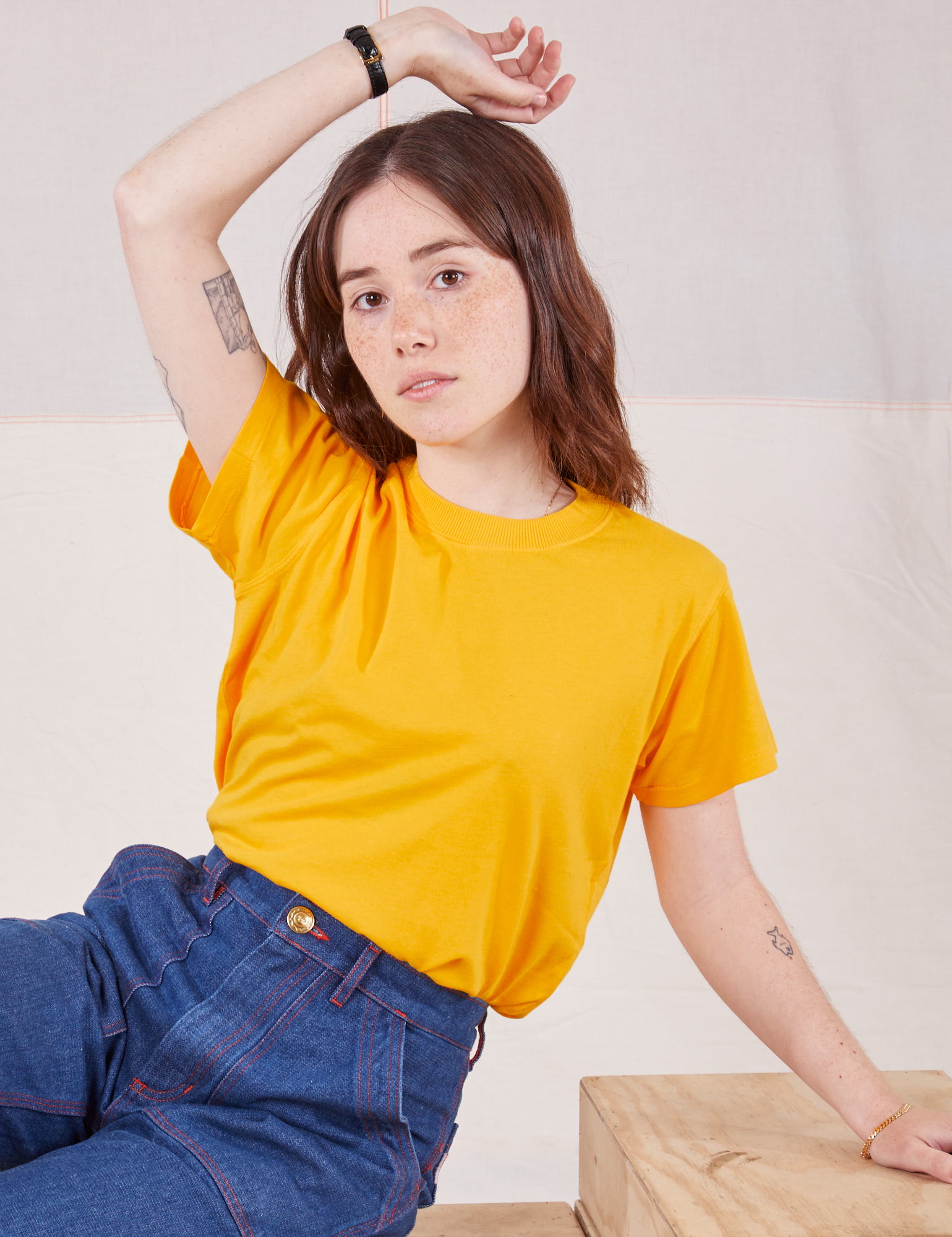Hana is wearing Organic Vintage Tee in Sunshine Yellow