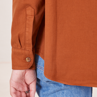 Sleeve close up of Oversize Overshirt in Burnt Terracotta worn by Alex