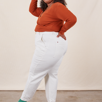 Work Pants in Vintage Off-White side view on Morgan wearing a burnt terracotta Wrap Top