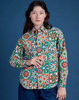 Alex is wearing a buttoned up Cropped Overshirt in Quilt Print