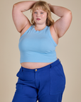 Juliet is 5’7” and wearing L Racerback Tank in Baby Blue