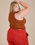 Racerback Tank in Burnt Terracotta angled back view on Juliet