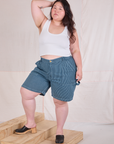Ashley is 5'7" and wearing 1XL Railroad Carpenter Shorts in Baby Blue