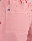 Close up of Longline Work Shorts in Baby Pink back pocket