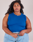 Morgan is 5'5" and wearing 1XL Muscle Tee in Royal Blue