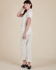 Angled back view of Short Sleeve Jumpsuit in Vintage Tee White on Alex