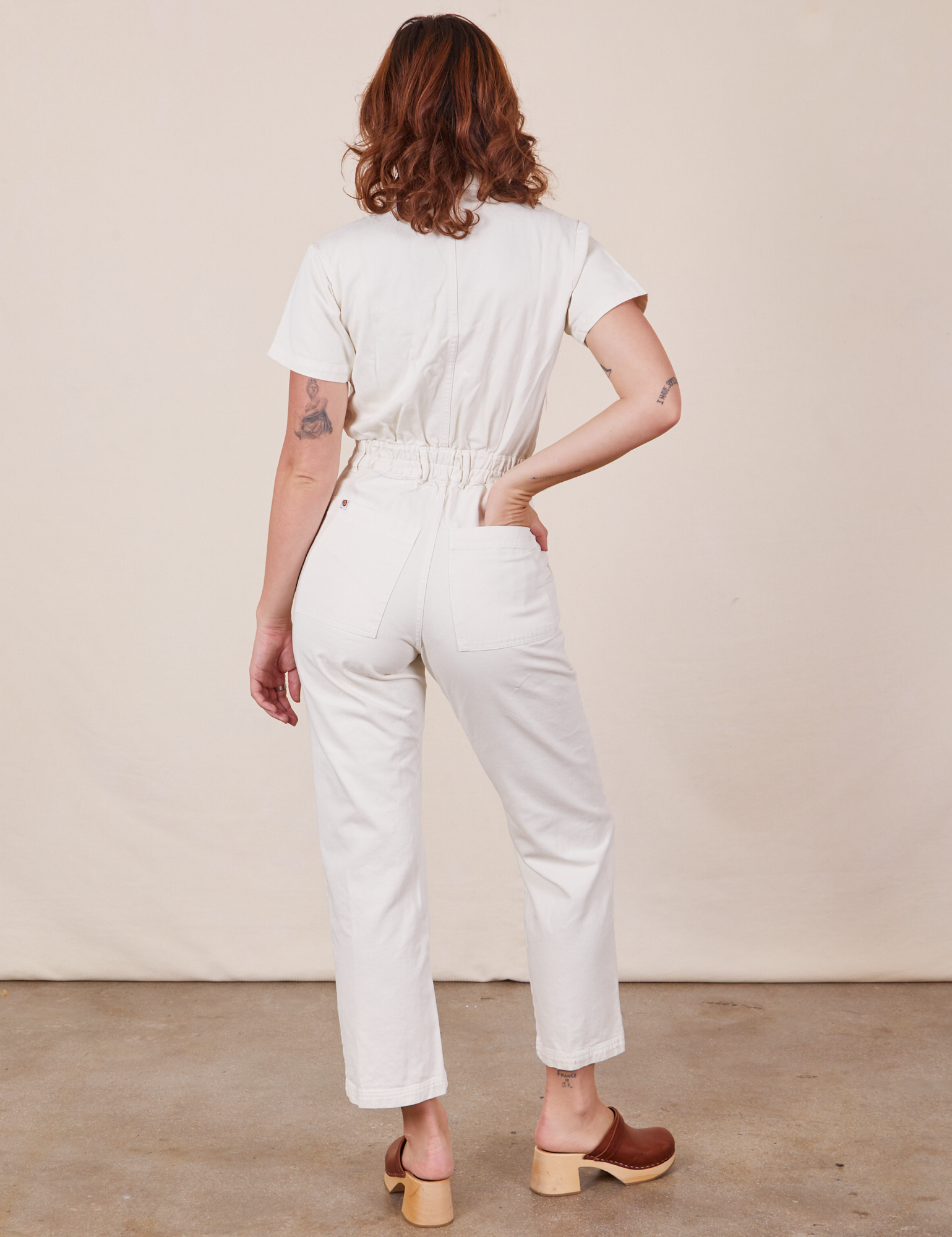 Back view of Short Sleeve Jumpsuit in Vintage Tee Off-White worn by Alex