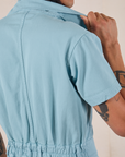 Short Sleeve Jumpsuit in Baby Blue back shoulder close up on Anthony