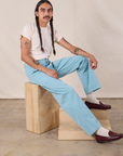 Anthony is wearing Work Pants in Baby Blue and Organic Vintage Tee in Vintage Tee Off-White