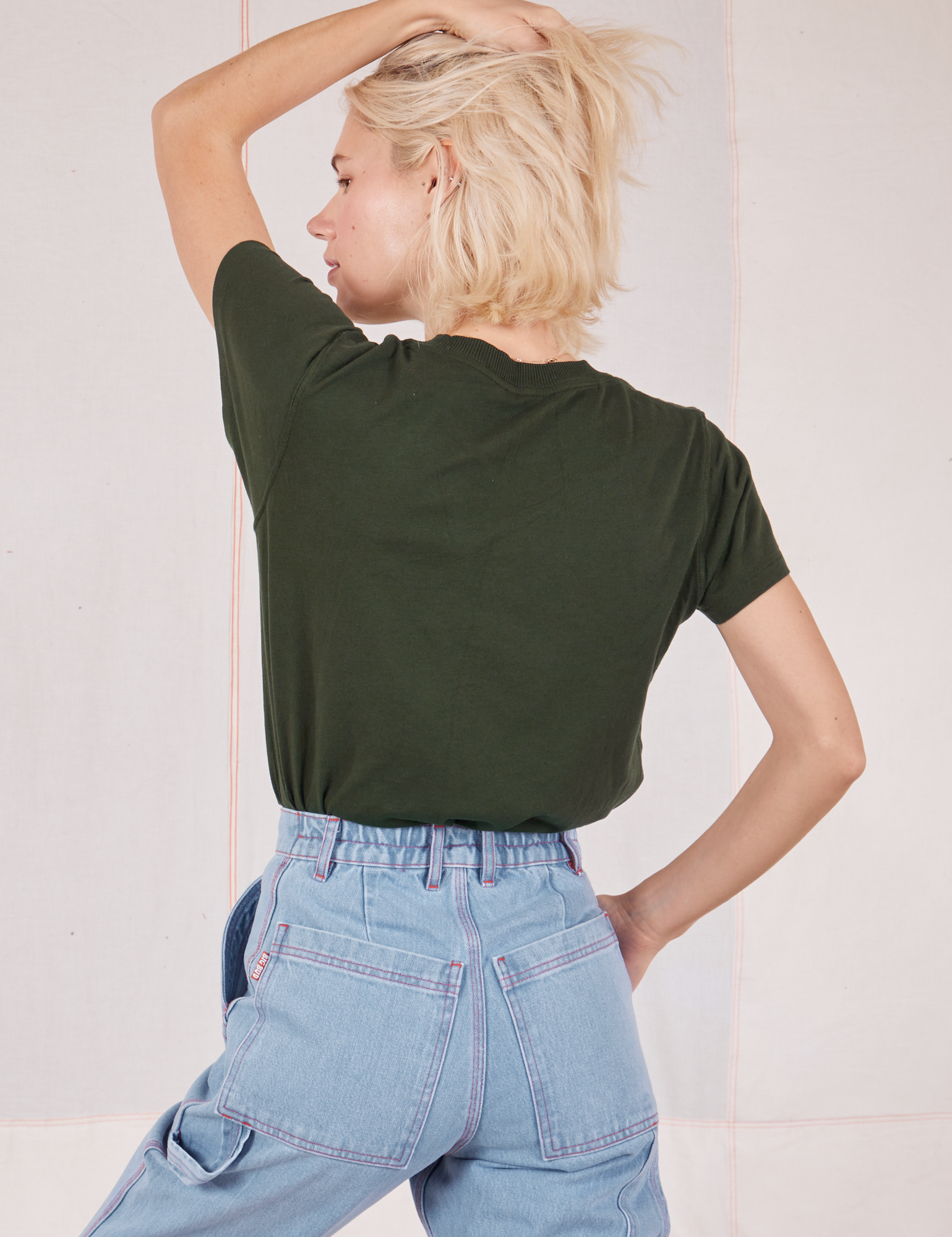 Organic Vintage Tee in Swamp Green back view on Madeline
