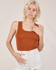 Madeline is wearing Tank Top in Burnt Terracotta