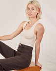 Madeline is wearing Tank Top in Vintage Tee Off-White and espresso brown Western Pants