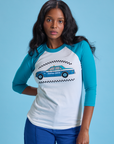 Kandia is 5'3" and wearing XS Taxi Raglan Tee in San Francisco
