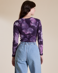 Long Sleeve Baby Tee in Dark Lavender back view on Alex