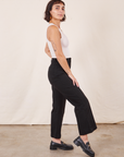 Western Pants in Basic Black side view on Soraya wearing a Tank Top in vintage tee off-white