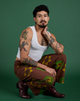 Floral Painted Work Pants in Brown and vintage tee white Cropped Tank on Jesse