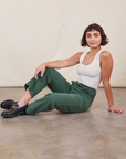 Work Pants in Dark Emerald Green on Soraya wearing vintage off-white Tank Top