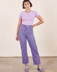 Soraya is 5'2" and wearing Petite XXS Work Pants in Faded Grape paired with lilac purple Baby Tee