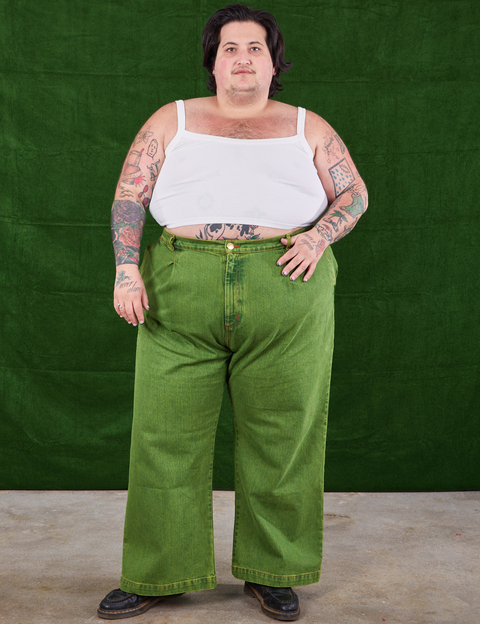Sam is 5&#39;10&quot; and wearing 2XL Overdyed Wide Leg Trousers in Gross Green paired with Cropped Cami in vintage tee off-white