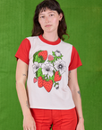 Alex is 5’8” and wearing P Anniversary Tee in Strawbaby
