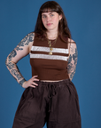 Sydney is 5’9” and wearing XXS Painted Muscle Tee in Fudgesicle Brown