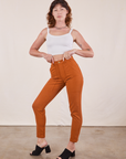Alex is 5'8" and wearing XXS Pencil Pants in Burnt Terracotta paired with Cropped Cami in vintage tee off-white 