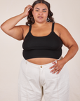 Alicia is wearing XL Cropped Cami in Basic Black worn with vintage tee off-white Western Pants