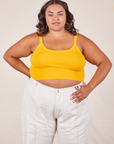 Alicia is 5'9" and wearing XL Cropped Cami in Sunshine Yellow paired with vintage tee off-white Western Pants
