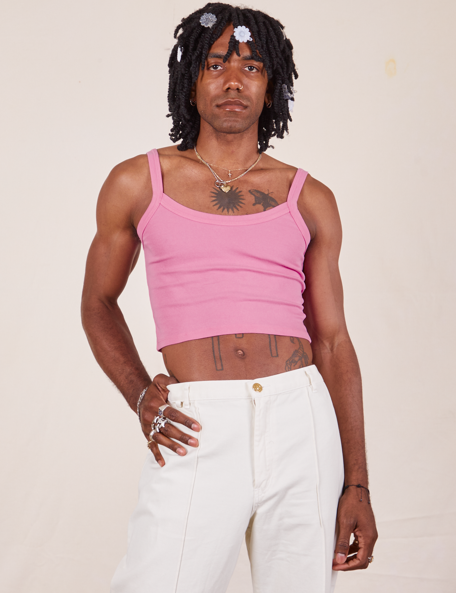 Jerrod is 6&#39;3&quot; and wearing S Cropped Cami in Bubblegum Pink paired with vintage tee off-white Western Pants