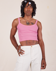Jerrod is 6'3" and wearing S Cropped Cami in Bubblegum Pink paired with vintage off-white Western Pants