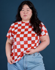 Ashley is 5'7" and wearing L Checker Organic Tee in Red