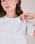 Cropped Burly Tee in Vintage Tee White close up on Alex