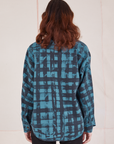 Plaid Flannel Overshirt in Marine Blue back view on Alex
