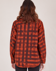 Back view of Plaid Flannel Overshirt in Paprika on Alex