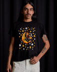 Anthony is 5'6" and wearing S Vintage Tee in Moon & Witch