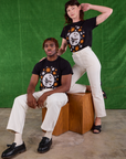 Alex and Issac are weraing Halloween Organic Tee in Moon paired with vintage tee off-white Work Pants