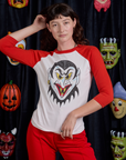 Alex is 5'8" and wearing P Raglan Tee in Dracula