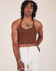 Jerrod is 6'3" and wearing XS Halter Top in Fudgesicle Brown