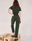 Heritage Short Sleeve Jumpsuit in Swamp Green back view on Alex