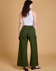 Heritage Wide Leg Trousers in Evergreen back view on Alex