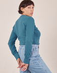 Angled back view of Honeycomb Thermal in Marine Blue worn by Tiara