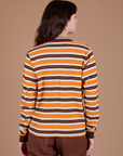 Back view of Long Sleeve Striped Burly Tee in Orange on Alex
