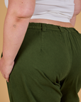 Baggy Mid-Rise Trousers in Evergreen back close on Juliet