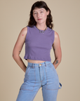 Alex is 5’8” and wearing XP Muscle Tee in Faded Grape