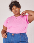 Morgan is 5'5" and wearing L Organic Vintage Tee in Bubblegum Pink tucked into dark wash Carpenter Jeans