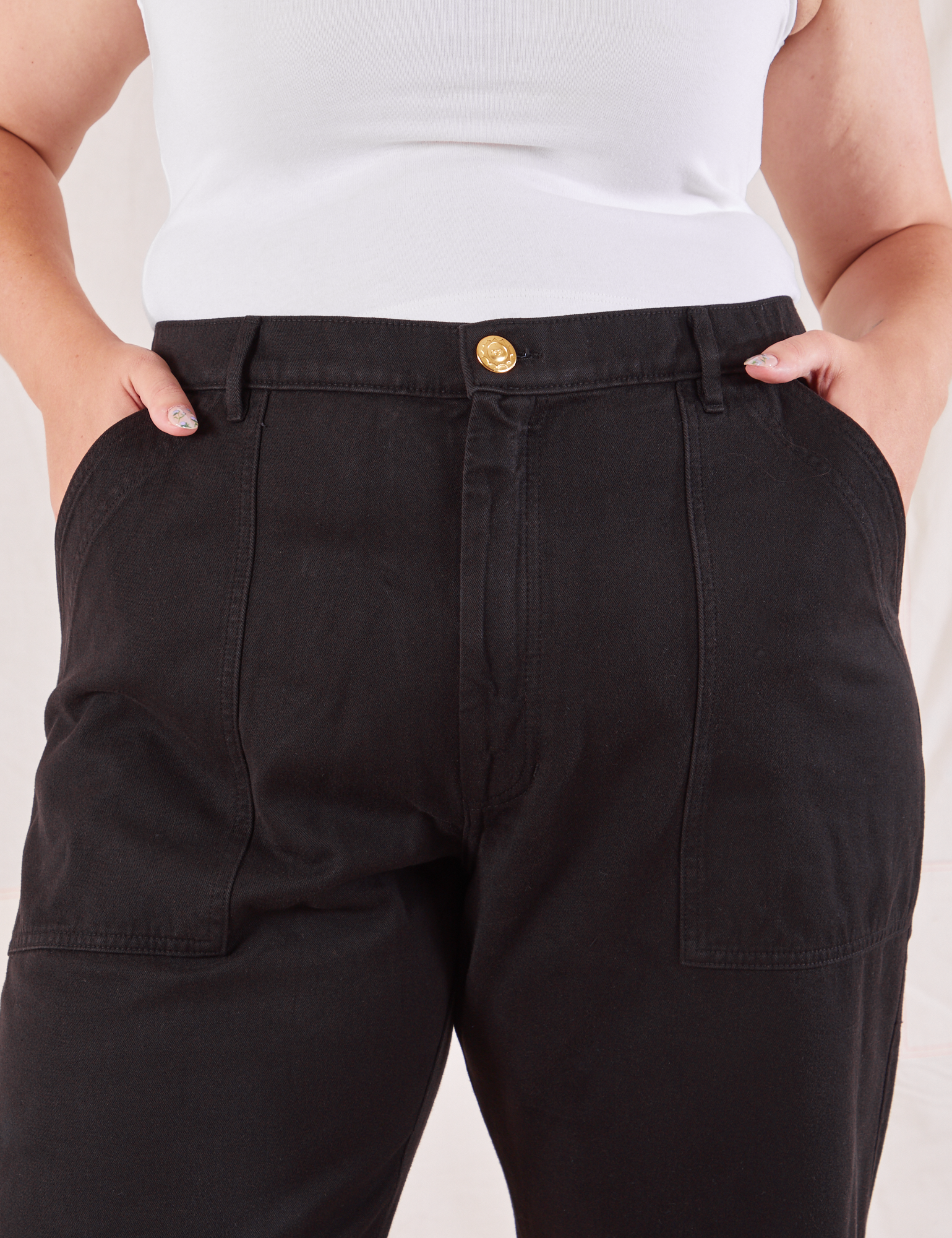 Organic Work Pants in Basic Black front close up on Ryan