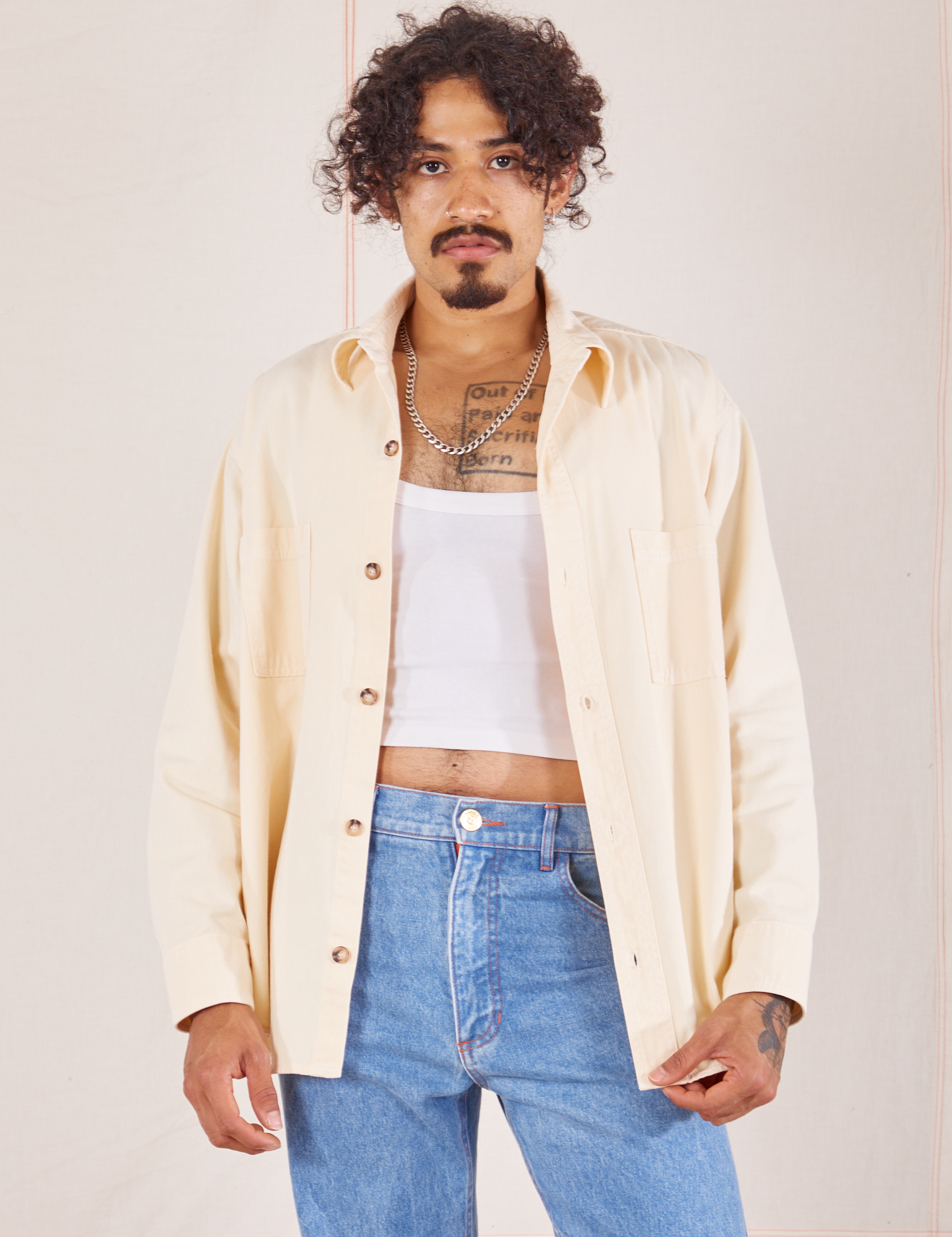 Jesse is wearing Oversize Overshirt in Vintage Tee Off-White