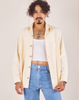 Jesse is wearing Oversize Overshirt in Vintage Tee Off-White