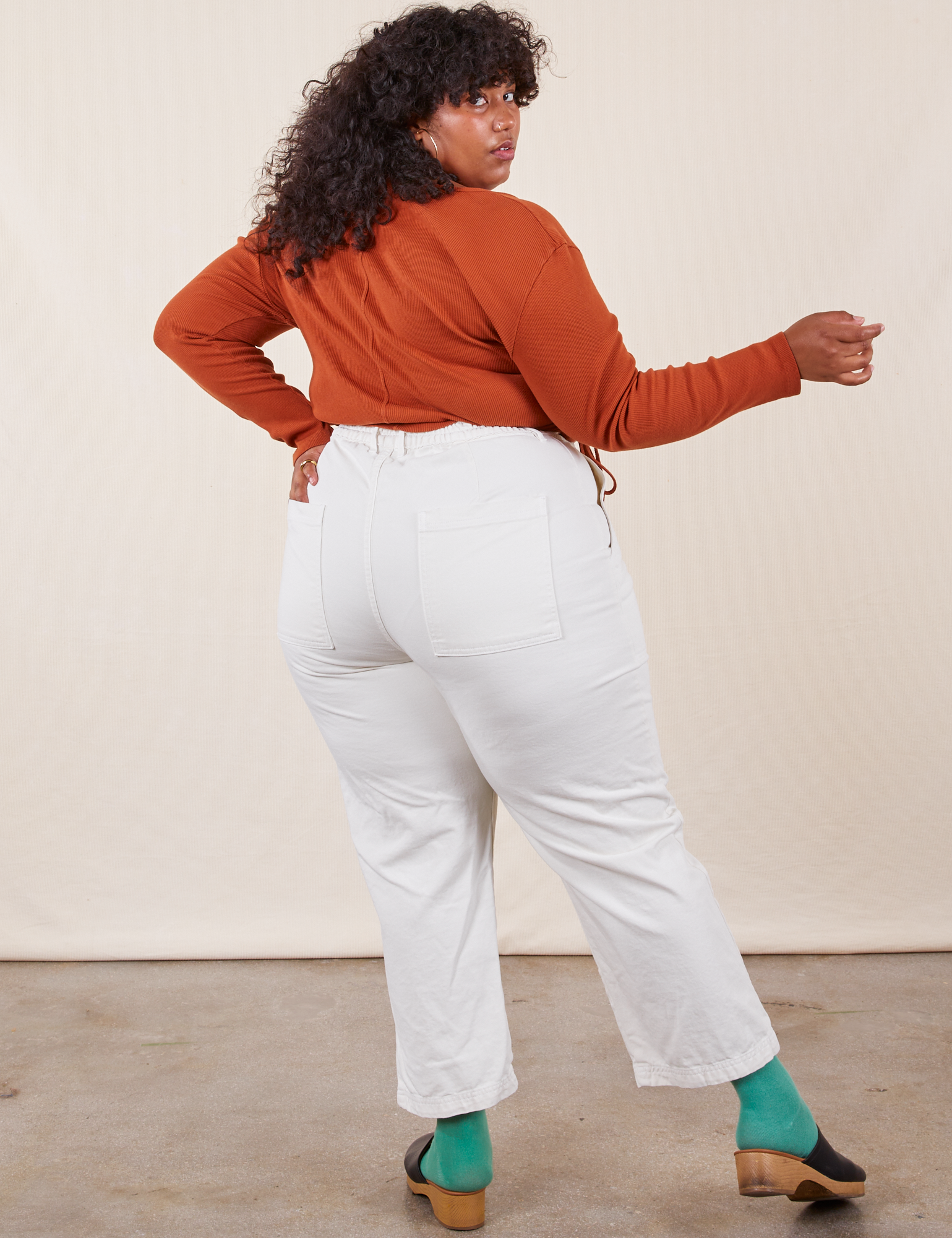 Work Pants in Vintage Off-White back view on Morgan wearing burnt terracotta Wrap Top