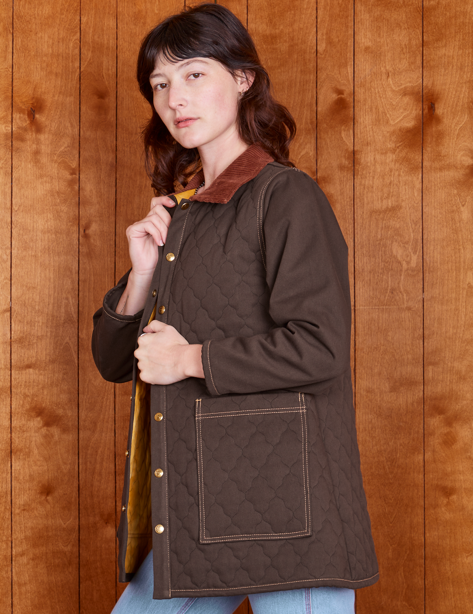 Side view of Quilted Overcoat in Espresso Brown on Alex